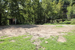 Empty land where a home once stood is pictured.